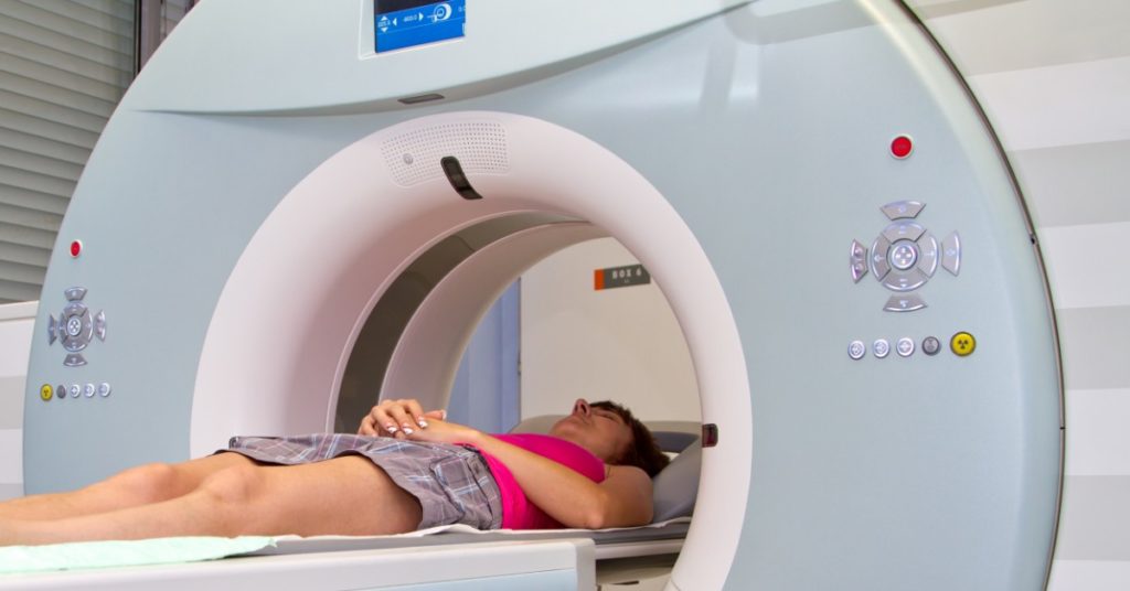 image of a woman lying on an MRI platform