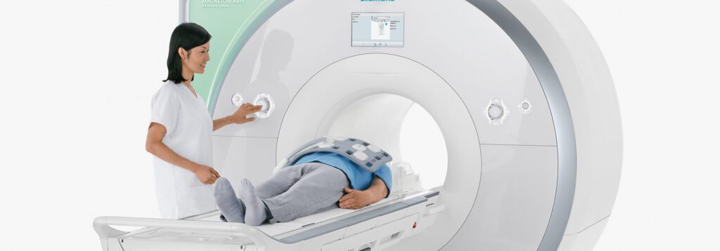 CT Scanner with patient and radiology technician at Touchstone Medical Imaging