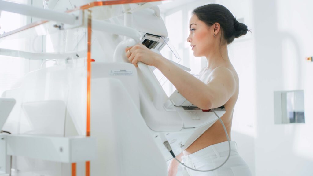 Woman getting a 3D mammography at an outpatient imaging center