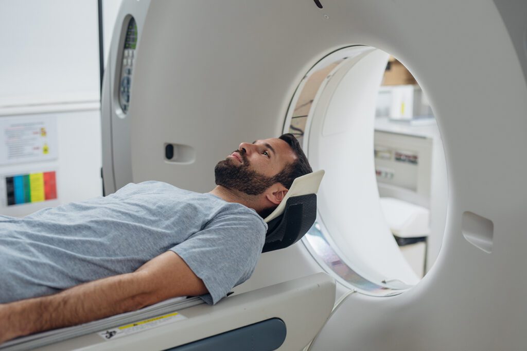 Patient Laying on CT table before a CT imaging scan